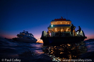Dive boats at dusk by Paul Colley 